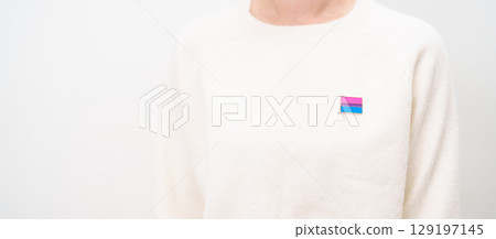Bisexuality Celebrate Day and LGBT pride month, LGBTQ or LGBTQIA concept. Hand holding purple, pink and blue flag shape for Lesbian, Gay, Bisexual, Transgender, Queer, Pansexual, Marriage Equality Law Bisexuality Celebrate Day and LGBT pride month, LGBTQ or LGBTQIA concept. Hand holding purple, pink and blue flag shape for Lesbian, Gay, Bisexual, Transgender, Queer, Pansexual, Marriage Equality Law 129197145