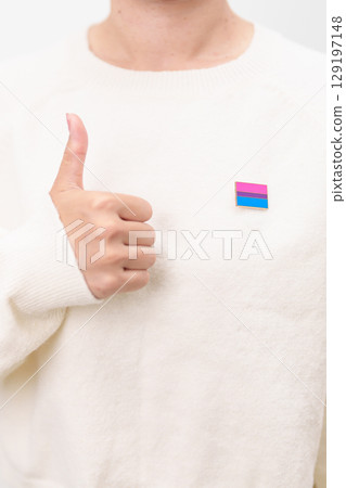 Bisexuality Celebrate Day and LGBT pride month, LGBTQ or LGBTQIA concept. Hand holding purple, pink and blue flag shape for Lesbian, Gay, Bisexual, Transgender, Queer, Pansexual, Marriage Equality Law Bisexuality Celebrate Day and LGBT pride month, LGBTQ or LGBTQIA concept. Hand holding purple, pink and blue flag shape for Lesbian, Gay, Bisexual, Transgender, Queer, Pansexual, Marriage Equality Law 129197148