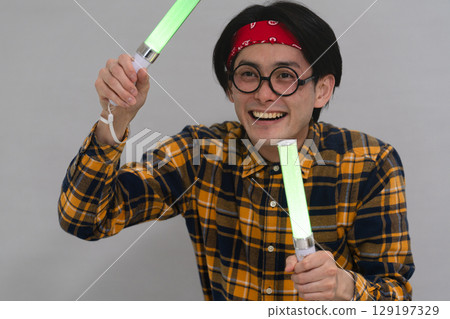 Young man wearing checked clothes Young man wearing checked clothes 129197329