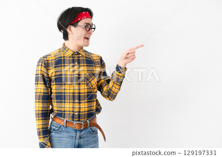 Young man wearing checked clothes Young man wearing checked clothes 129197331
