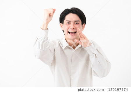 Young man wearing a long-sleeved white shirt Young man wearing a long-sleeved white shirt 129197374