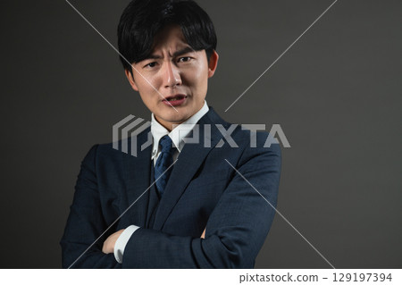 Young man in a suit Business image 129197394