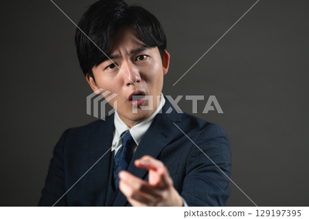 Young man in a suit Business image 129197395