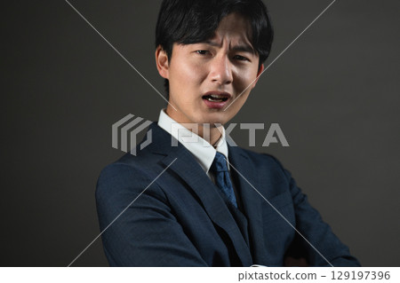 Young man in a suit Business image Young man in a suit Business image 129197396