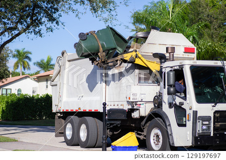 A scene of trash collection at an average American household 129197697