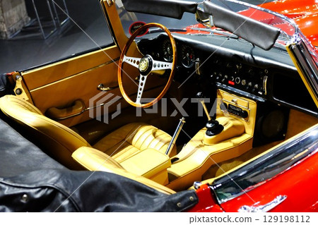 Driver's seat of a left-hand drive classic car 129198112