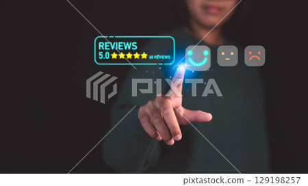Customer select a happy face icon on digital feedback. Concept of customer satisfaction, testimonials, online reviews, user feedback, review rankings and service quality. 129198257