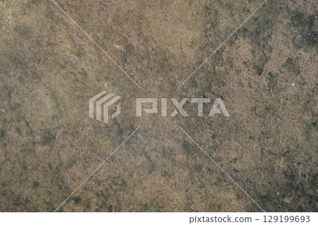 Old grunge weathered natural stone ground texture 129199693