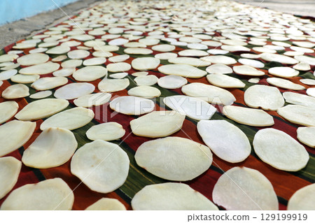Homemade Sun Drying Potato Slices for Chips 129199919