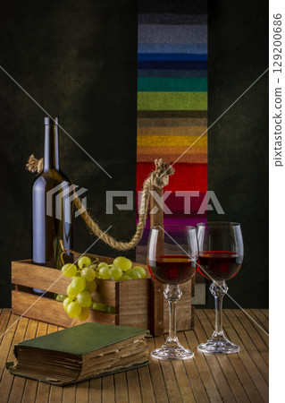 Still life with grapes and wine in glasses Still life with grapes and wine in glasses 129200686