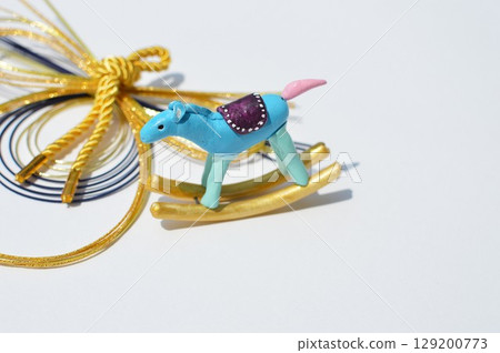 Paper clay rocking horse and mizuhiki decoration New Year's material 129200773