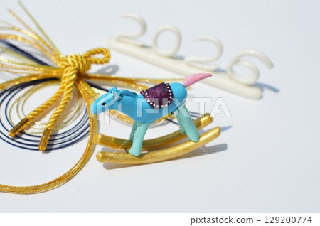 Paper clay rocking horse and mizuhiki decoration New Year's material 129200774