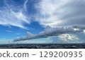 Long cumulus clouds stretching over Kawasaki City 129200935