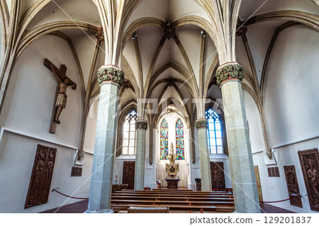 St. Stephans cathedral in Passau, Germany is an old white church with green metal domes on top of the towers 129201837