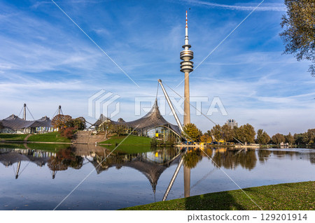 Golden autumn view in the Olympiapark in Munich, Germany, an Olympic Park for the 1972 Summer Olympics Golden autumn view in the Olympiapark in Munich, Germany, an Olympic Park for the 1972 Summer Olympics 129201914