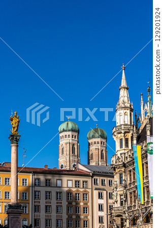 View on Marienplatz town hall and Frauenkirche in Munich, Germany 129201924