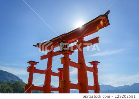 Close-up view of the famous Itsukushima shrine red torii gate in Miyajima, Japan Close-up view of the famous Itsukushima shrine red torii gate in Miyajima, Japan 129202581