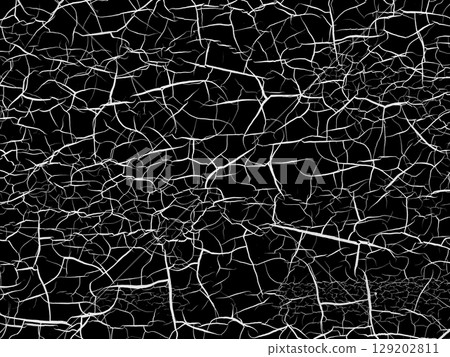 A background of fine white cracks on a black background A background of fine white cracks on a black background 129202811