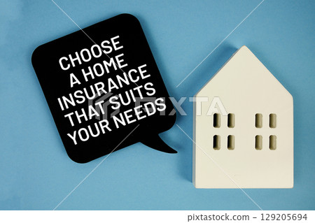 Choose a home insurance that suits your needs text with house model on blue background 129205694