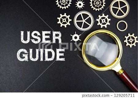 User Guide text message with magnifying glass on black background User Guide text message with magnifying glass on black background 129205711