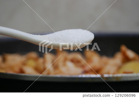Cooking process with salt added to savory dish 129206096