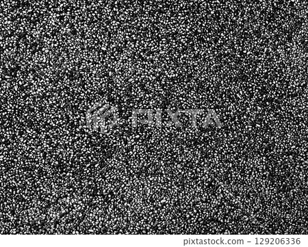 Monochrome background filled with bumpy pebbles 129206336