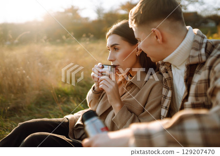 Stylish couple walking autumn weather. People, lifestyle, relaxation concept. Autumn Fashion concept 129207470