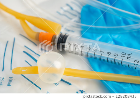 Foley catheter and urine drainage bag collect urine for disability or patient in hospital. 129208433