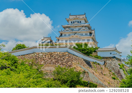A castle tower staring in the blue sky A castle tower staring in the blue sky 129208528