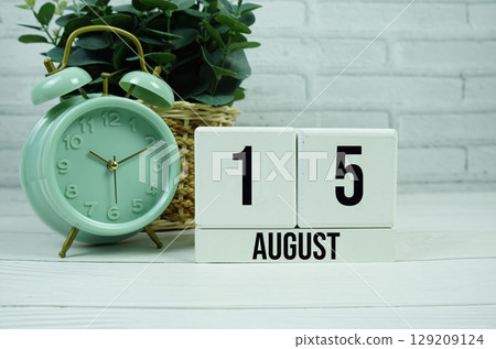 Wooden Calendar Showing the Date of August 15th. Day 15 of August month 129209124