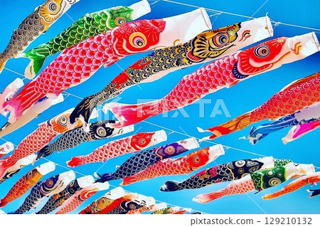 Carp streamers swimming in the sky above the coast 11 129210132