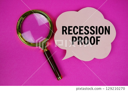 Recession Proof text with speech bubble and magnifying glass on pink background 129210270