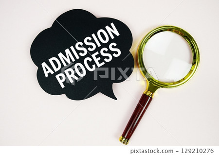 Admission Process text with speech bubble and magnifying glass on pink background Admission Process text with speech bubble and magnifying glass on pink background 129210276