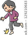 Elderly woman stumbling 129210683