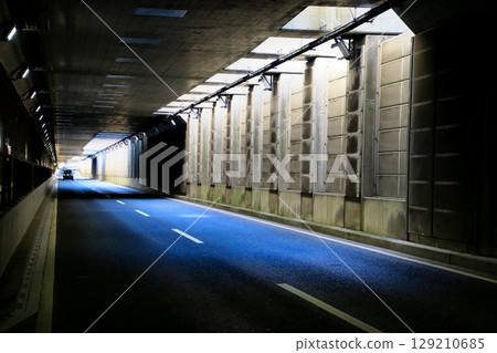 A road underpass that exudes a futuristic atmosphere A road underpass that exudes a futuristic atmosphere 129210685