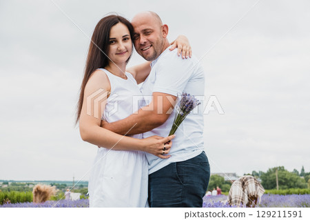 The lavender field radiates tenderness and warmth The lavender field radiates tenderness and warmth 129211591