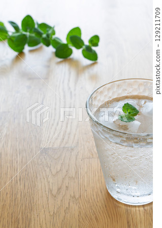Ice cold water with mint Ice cold water with mint 129211709