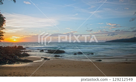 Sunset over Kata Beach with rocky shore Phuket 129212549