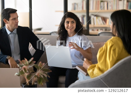 Indian woman conduct meeting with staff members in office Indian woman conduct meeting with staff members in office 129212617