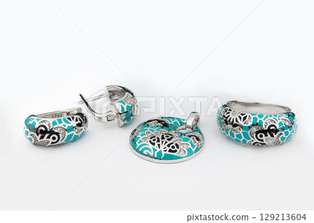 Silver jewels collection with crystals in minimalism style. Silver set of earrings and silver necklace 129213604