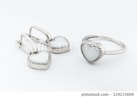 Silver jewels collection with crystals in minimalism style. Silver set of earrings and silver necklace 129213609