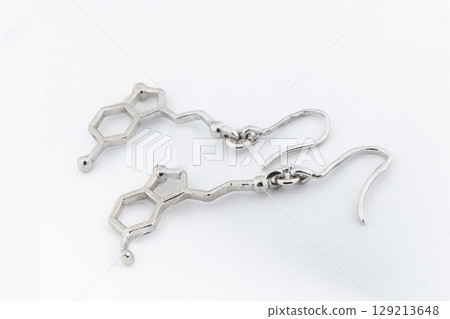 Luxury silver round earrings big jewelry for women isolated on white background, clipping path included Luxury silver round earrings big jewelry for women isolated on white background, clipping path included 129213648