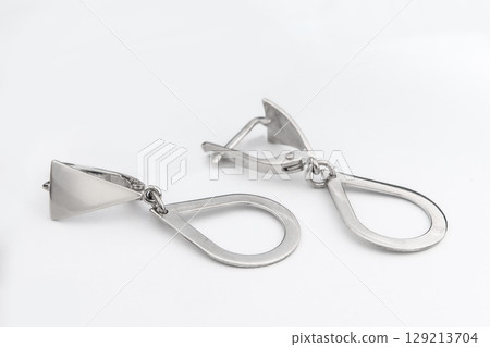 Luxury silver round earrings big jewelry for women isolated on white background, clipping path included 129213704