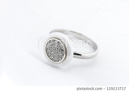 Silver diamond ring isolated on white background. Silver jewelry fashion ring Silver diamond ring isolated on white background. Silver jewelry fashion ring 129213717