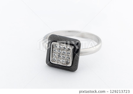 Silver minimalism diamond ring isolated on white background Silver minimalism diamond ring isolated on white background 129213723
