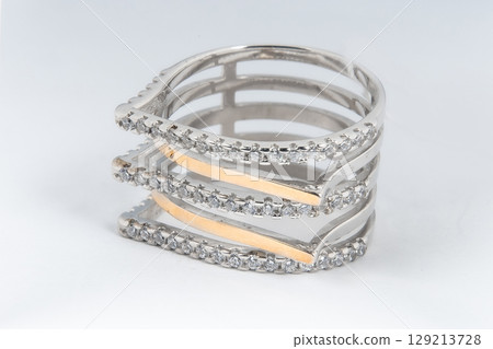 Silver minimalism diamond ring isolated on white background Silver minimalism diamond ring isolated on white background 129213728