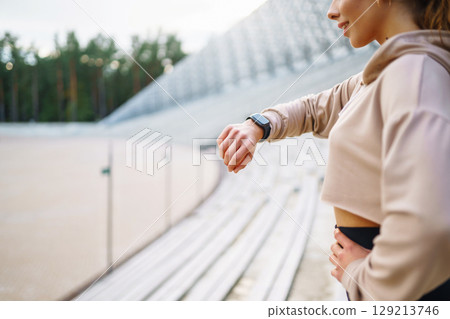 A young female athlete in special clothing is training on the court. Concept of sport, health. 129213746
