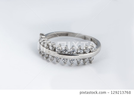 Silver diamond ring isolated on white background. Silver jewelry fashion ring Silver diamond ring isolated on white background. Silver jewelry fashion ring 129213768