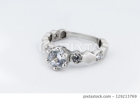 Silver diamond ring isolated on white background. Silver jewelry fashion ring Silver diamond ring isolated on white background. Silver jewelry fashion ring 129213769