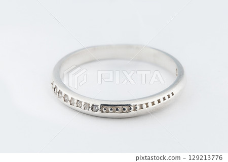 Silver diamond ring isolated on white background. Silver jewelry fashion ring Silver diamond ring isolated on white background. Silver jewelry fashion ring 129213776